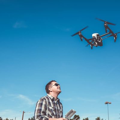 man-flying-drone